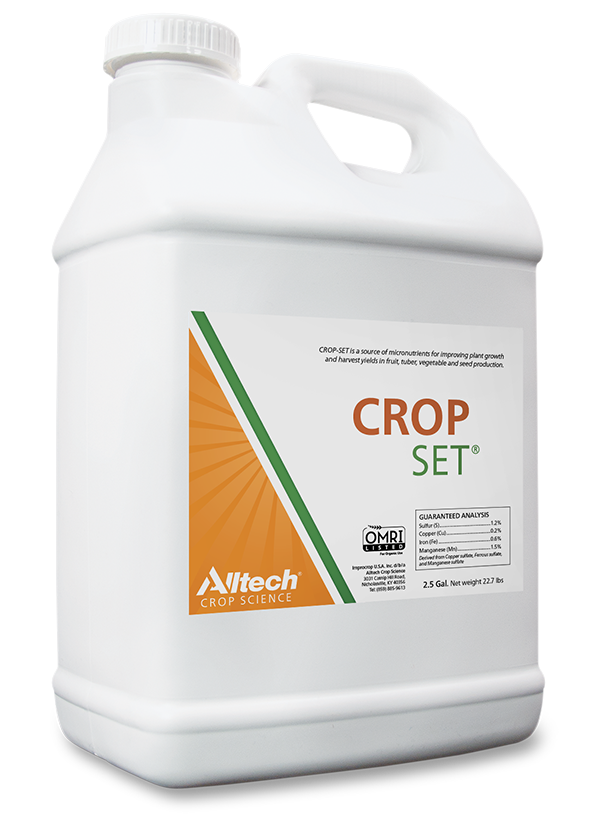 The image shows a bottle of "CROP SET," a product by Alltech Crop Science. The container is white with a handle, and features a logo along with text indicating it's a source for improving plant growth. It has a measured capacity of 2.5 gallons.
